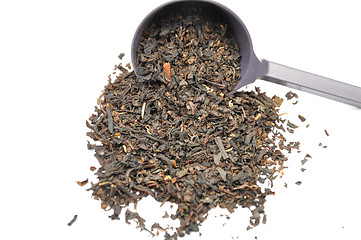 Image showing Detailed but simple image of black tea mix with metering spoon