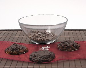 Image showing Selfmade gingerbread and a bowl of grater-chocolate 