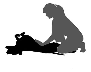 Image showing Woman caresses a dog