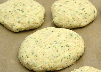 Image showing Potato herbs burger on a baking tray