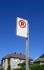 Image showing No parking sign in front of a new house