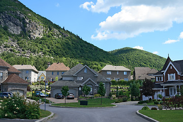 Image showing Expensive houses near the beautiful mountains