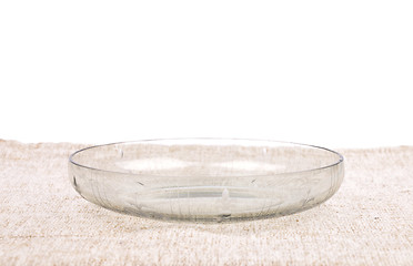 Image showing Bowl of glass on linen