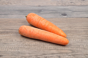 Image showing Carrots on wood