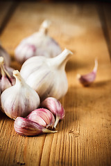 Image showing Raw Garlic On Wooden Background