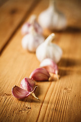 Image showing Raw Garlic On Wooden Background