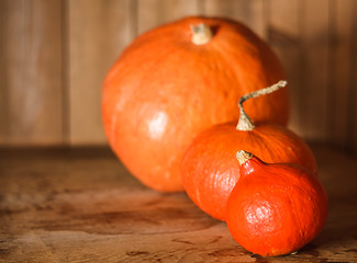 Image showing Pumpkins On Grunge Wooden Backdrop Background