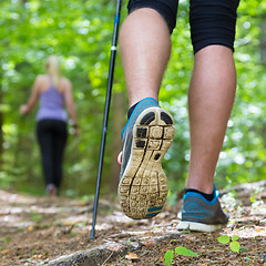 Image showing Young couple hiking in nature. Sport and exercise.