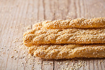 Image showing bread sticks grissini with sesame seeds
