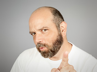 Image showing bearded man pointing