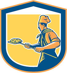 Image showing Baker Pizza Maker Holding Peel Pizza Shield 