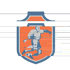 Image showing Metallic Soccer Player Kicking Ball Shield Retro