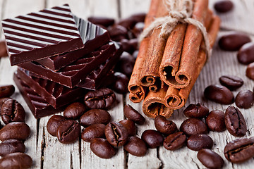 Image showing chocolate sweets, cinnamon and coffee beans