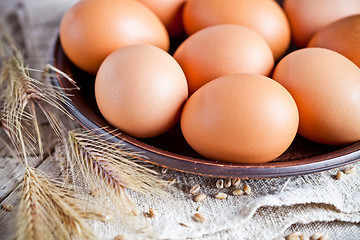 Image showing fresh brown eggs on a plate