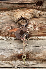 Image showing  old padlock with key