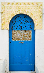 Image showing Blue door with ornament and arch from Sidi Bou Said in Tunisia