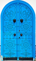 Image showing Traditional blue arched door from Sidi Bou Said in Tunisia