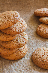 Image showing Stacked Brown Cookies On Rustic Background