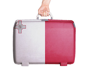 Image showing Used plastic suitcase with stains and scratches