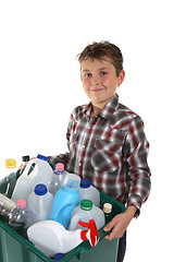 Image showing Child carrying recycling