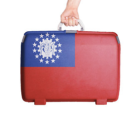 Image showing Used plastic suitcase with stains and scratches