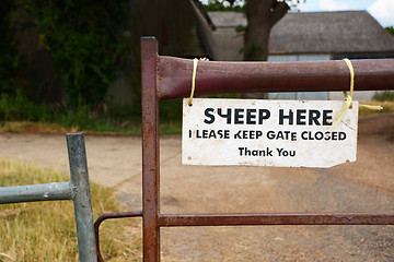 Image showing Weathered notice on a farm gate