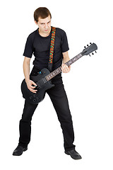Image showing Young man with electric guitar isolated on white background. Per