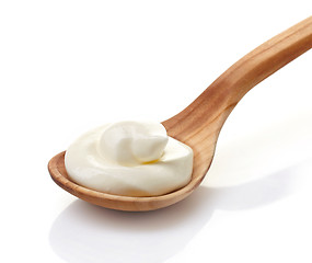 Image showing cream in a wooden spoon