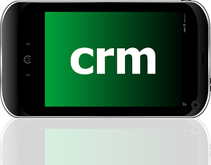 Image showing crm word on smart mobile phone, business concept