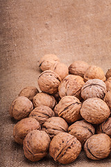 Image showing Walnuts Close-up On The Sackcloth Background 