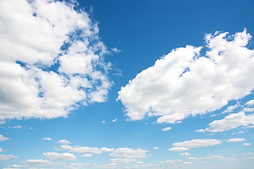 Image showing Cumulus clouds in a bright blue sky.