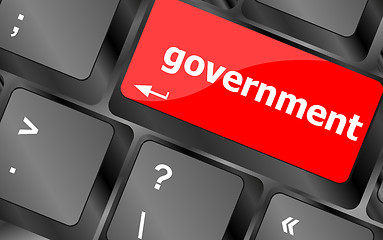 Image showing government word on keyboard key, notebook computer button