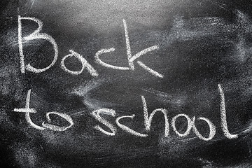 Image showing Handwritten message on chalkboard writing message Back to school