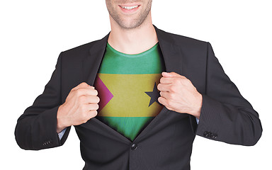 Image showing Businessman opening suit to reveal shirt with flag