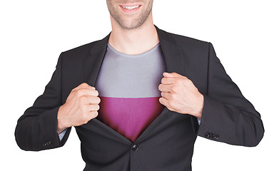 Image showing Businessman opening suit to reveal shirt with flag