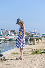 Image showing Portrait of a beautiful girl in harbor