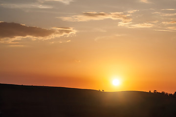 Image showing Silhouette of hill on sunset