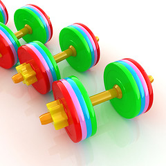 Image showing Colorful dumbbells on a white background