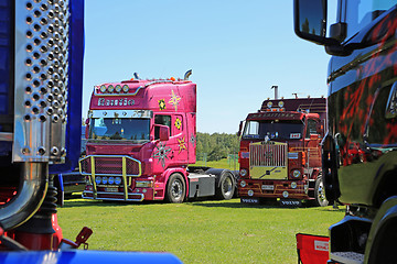 Image showing Pink Scania and Volvo F88 Vintage Truck in a Show