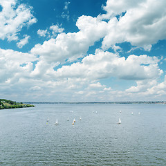 Image showing river with white yachts and cloudy sky