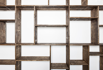 Image showing Rustic style shelves on white wall