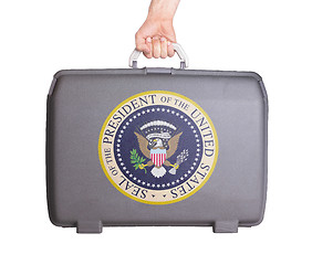 Image showing Used plastic suitcase with stains and scratches