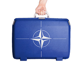 Image showing Used plastic suitcase with stains and scratches