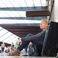 Image showing Female traveler waiting for departure.