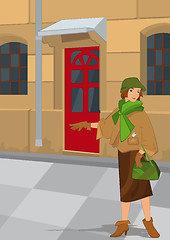 Image showing Retro girl near red door
