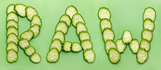 Image showing RAW word made of cucumber slices
