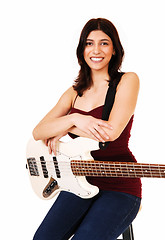 Image showing Sitting woman with guitar.