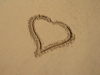 Image showing Heart-drawing in sand