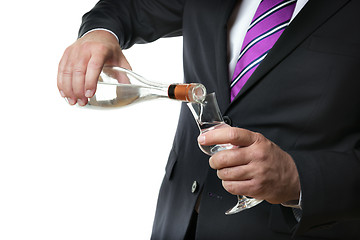 Image showing Business man with alcohol