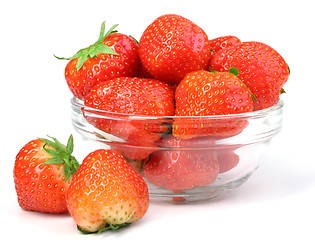 Image showing Red strawberries in transparent plate on white